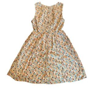 Loft 82 fit and flair dress with triangle pattern and cool side cut outs…
